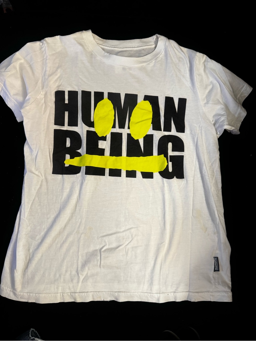 nununu White Tee with Black Text and Yellow Graphic